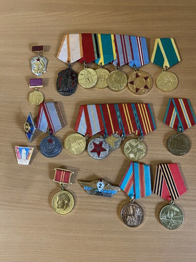 Медали и орден СССР, нагрудные знаки.