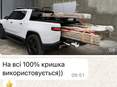 Силова багатофункціональна кришка кузова пікапа Rivian R1T від Tuning BVV. Накриття на кузов пікапа.