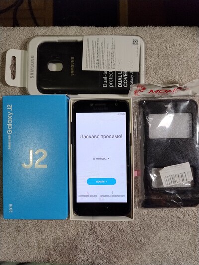 Телефон Galaxy J2, модель SM-J250F/DS.