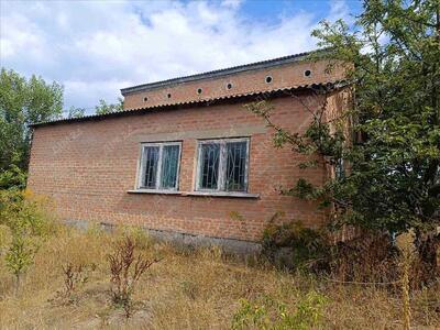 Цегляний будинок в Верхолах