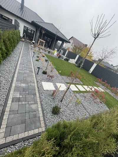 Укладання бруківки, водовідведення та благоустрій території