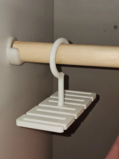 Зручний тримач для поясив та ременів