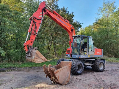 Оренда/послуги екскаватора O&K MH Plus екскаватор колісний спецтехніка
